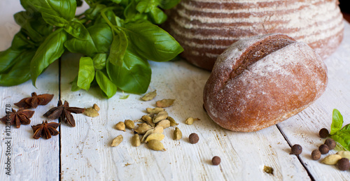 Bread and basil on the table