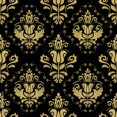 Damask seamless black and yellow ornament. Traditional pattern. Classic oriental background