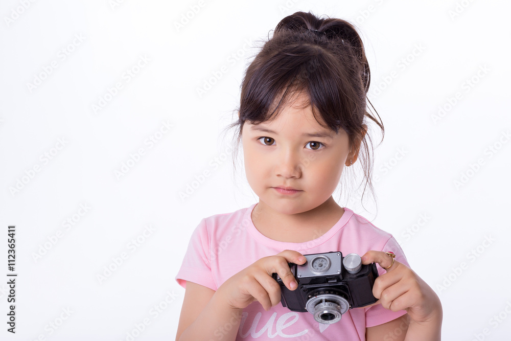 little girl holding an old camera little girl holding an old camera