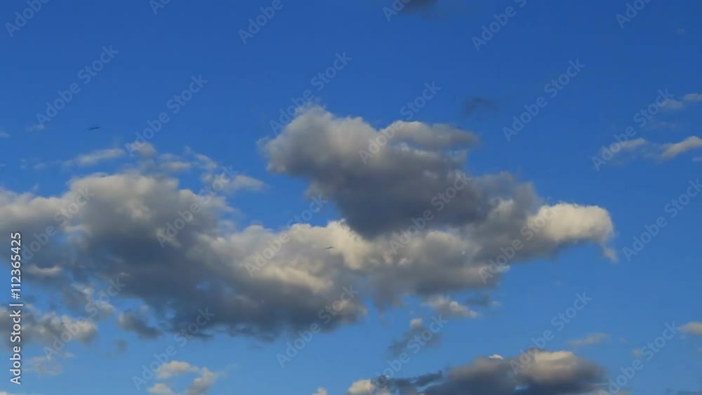 Time Lapse, motion gray, dark blue clouds on the background blue sky Time Lapse, motion gray, dark blue clouds on the background blue sky