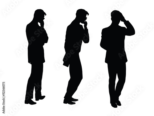 Male businessman thinks goes black silhouette figure