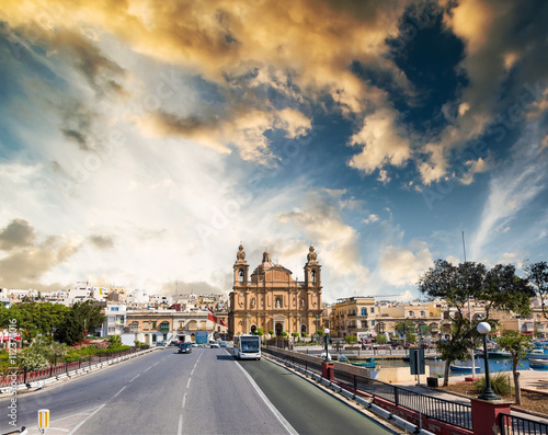picturesque photo of Msida Parish Church in Valletta from Triq Marina road in Malta