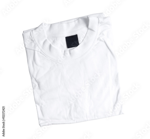folded white t-shirt isolated on a white background