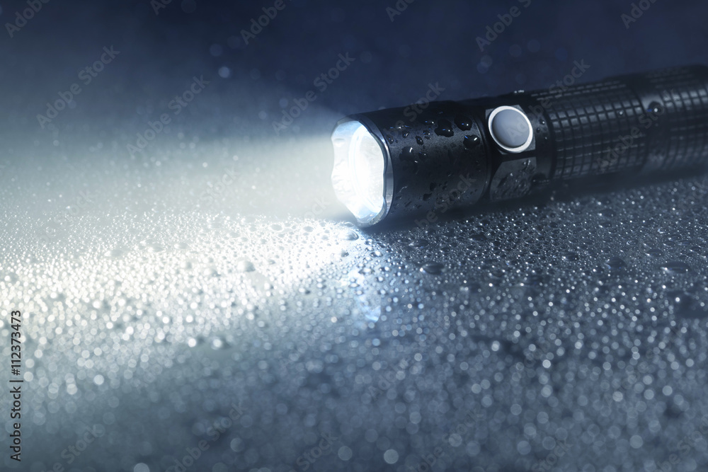 Waterproof flashlight - obrazy, fototapety, plakaty 