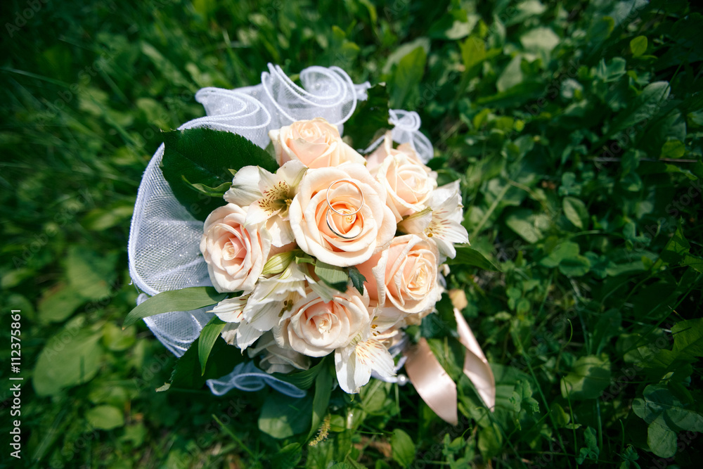 Wedding bouquet from peach-colored roses Wedding bouquet from peach-colored roses