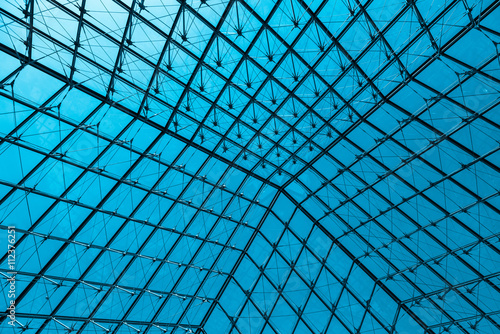 Abstract modern glass ceiling, blue toned