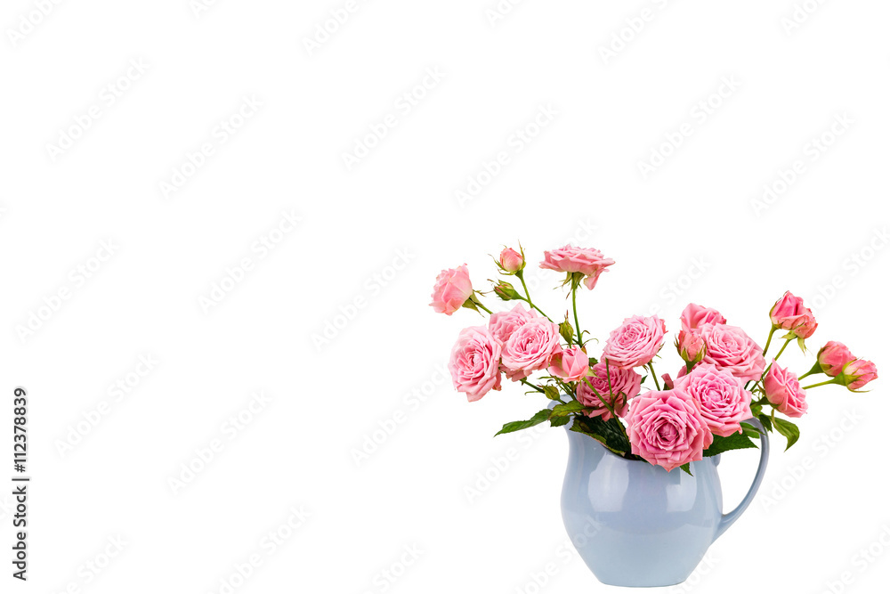 Pink flowers in blue jug. Pink flowers in blue jug.