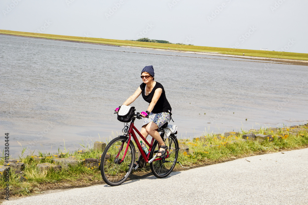 Woman take a vacation bike seaside Woman take a vacation bike seaside