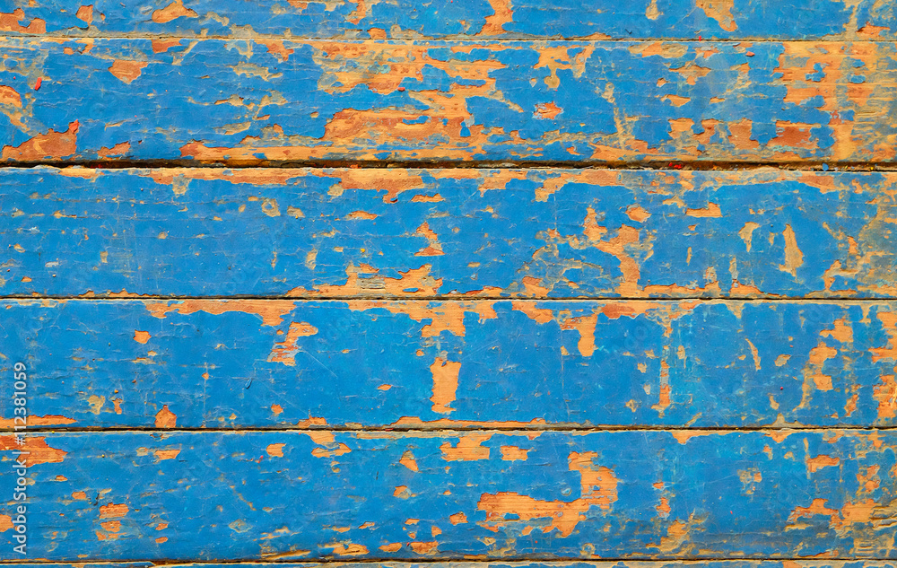 old colored paint on the wooden floor