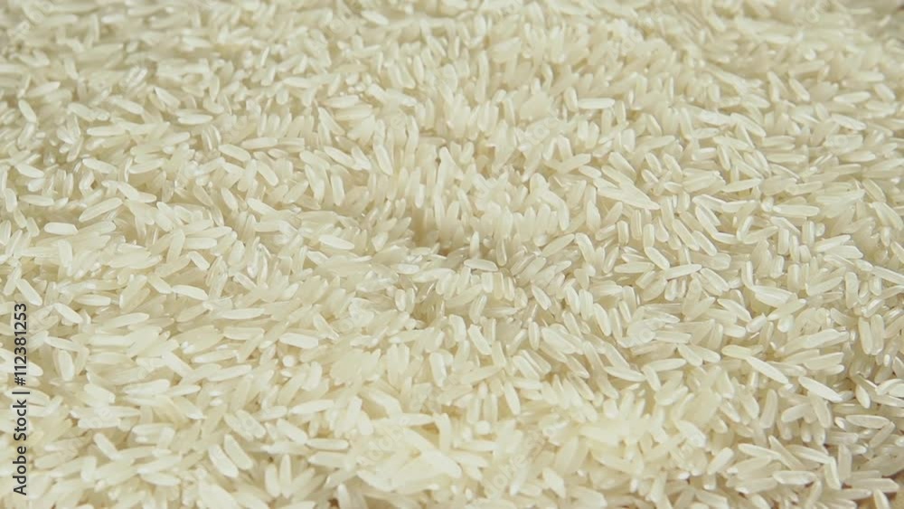 SLOW: A white rice flows into a crater SLOW: A white rice flows into a crater