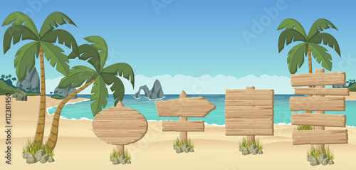 Wooden signs on a beautiful tropical beach
