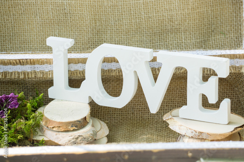 Decorated wagon with vases, flowers and handmade things for fash photo