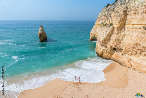 Family at beautiful beach Carvalho of Algarve, Portugal