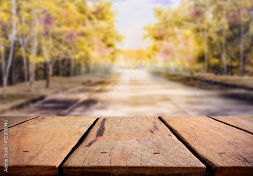 rustic table and road in the forest.
