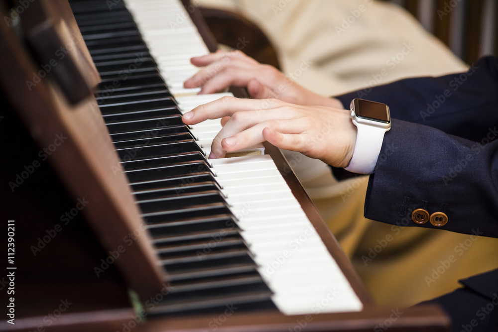 Fototapeta premium Hands playing the piano