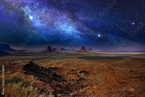 starry night sky over the monument valley