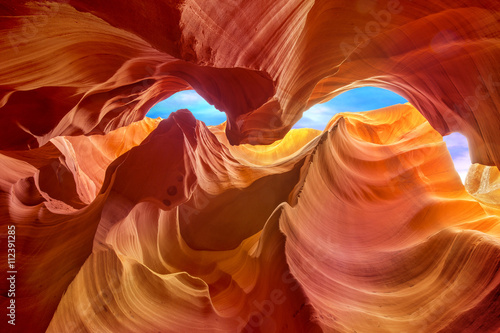 multicolored rock formations inside the antelope canyon photo