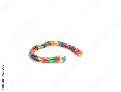 Rainbow loom, Colored rubber bands for weaving accessories isolate white background