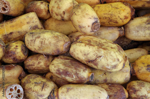 Detail of lotus root pile in market place
