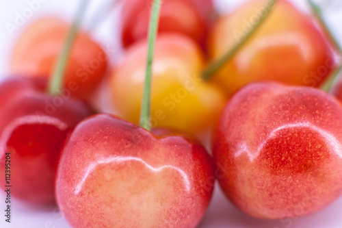 Yellow cherries isolated on the white background