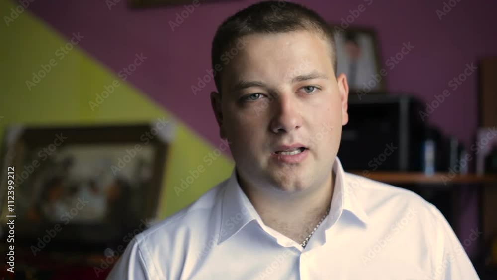 Man talking to camera as if being interviewed Man talking to camera as if being interviewed