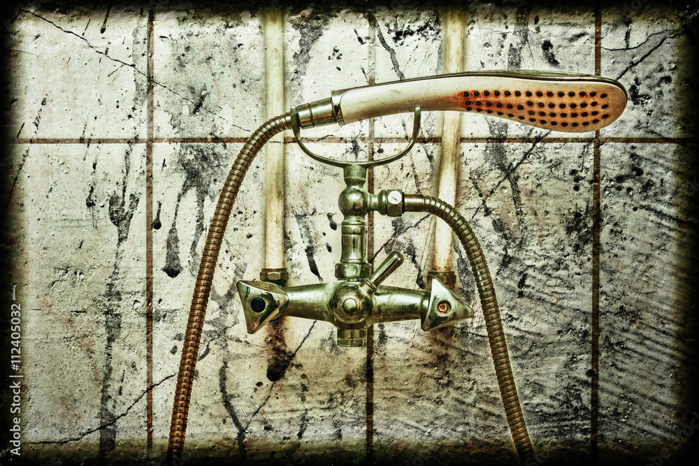Old rusty iron hand shower. Old rusty iron hand shower.