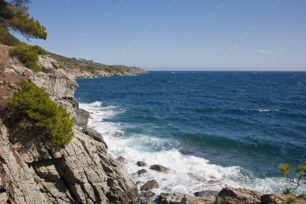 Beautiful view of waves crushing against the rocks at Mediterranean Sea. Beautiful view of waves crushing against the rocks at Mediterranean Sea.