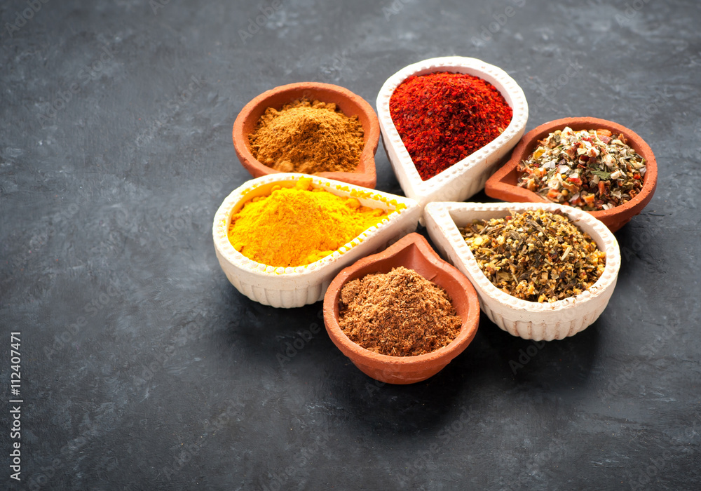 Spices, herbs and spicy spices in bowls Spices, herbs and spicy spices in bowls