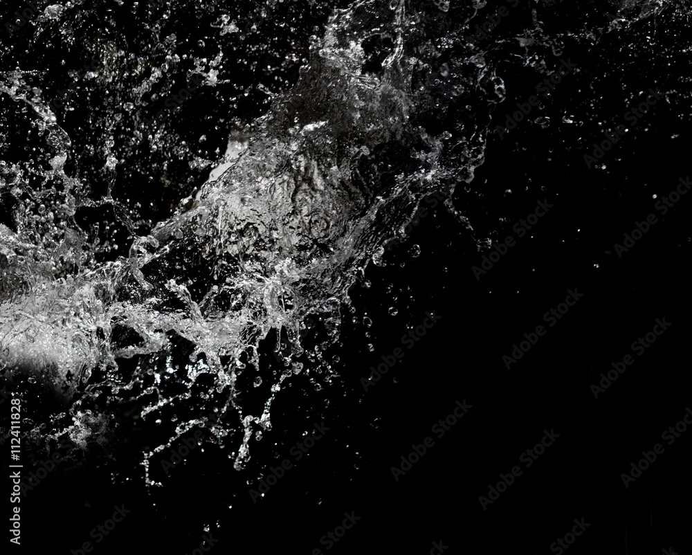 Fototapeta premium Stylish water splash. Isolated on black background