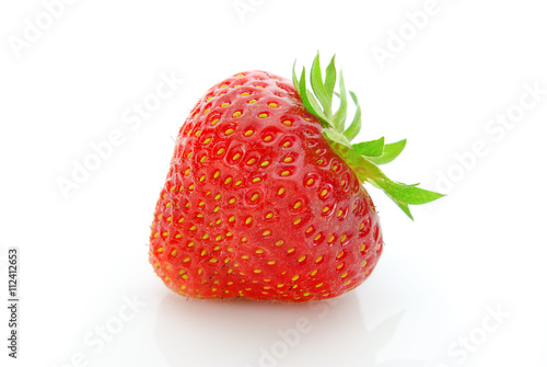 Red, ripe strawberry isolated on white background