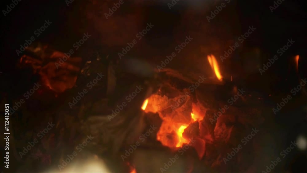 Closeup of firewood burning in fire Closeup of firewood burning in fire