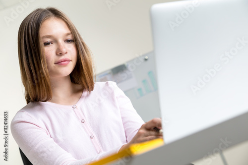 Woman using laptop closeup