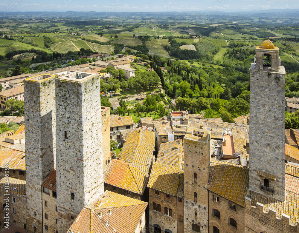 aerial view to towers and chapel in old city  in Tuscany in Italy