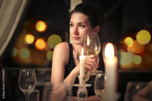 Young lady drinking wine