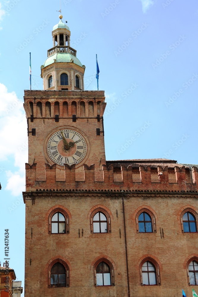 Clock tower of Palazzo d’Accursio at Piazza Maggiore in Bologna, Italy
