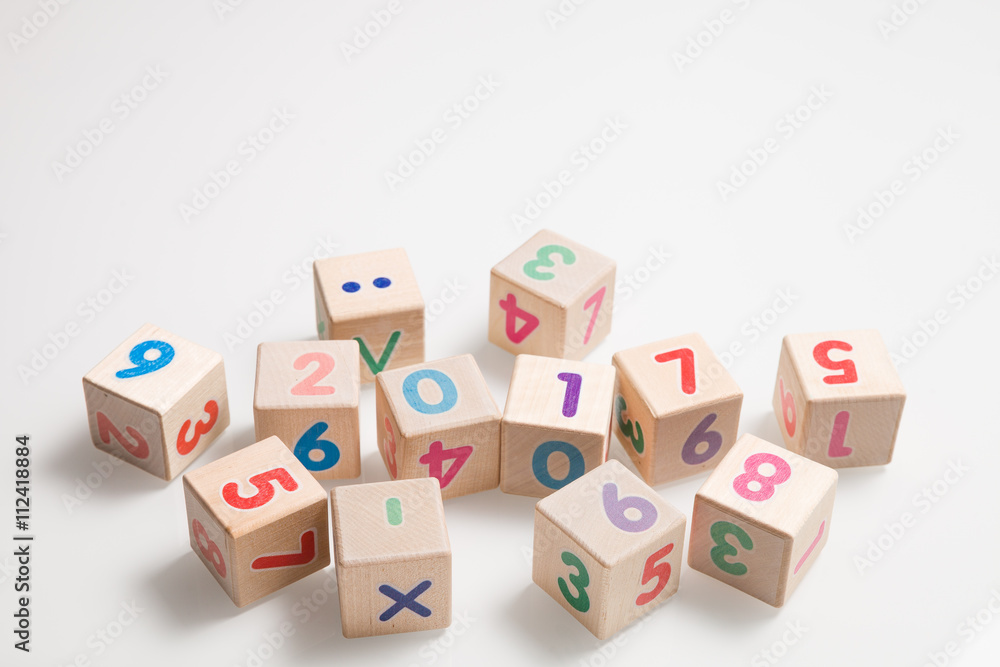 wooden cubes with numbers on a white background. Education and learning concept. 2017 school year. wooden cubes with numbers on a white background. Education and learning concept. 2017 school year.