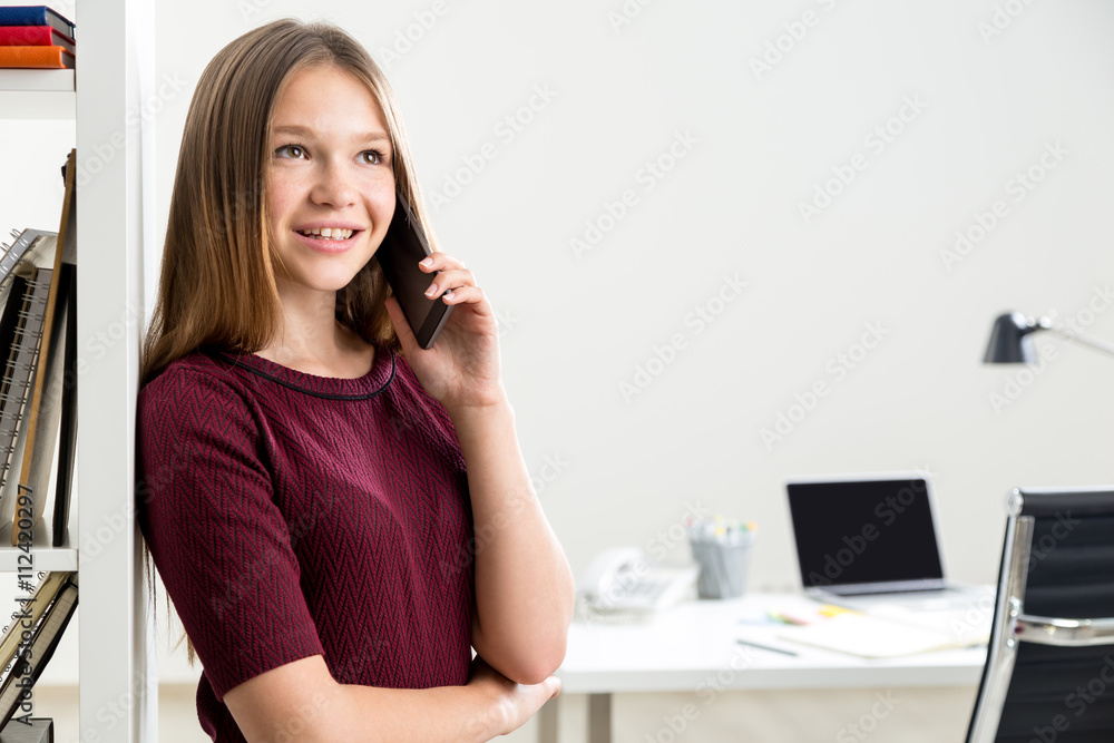Cheerful businesswoman on phone Cheerful businesswoman on phone