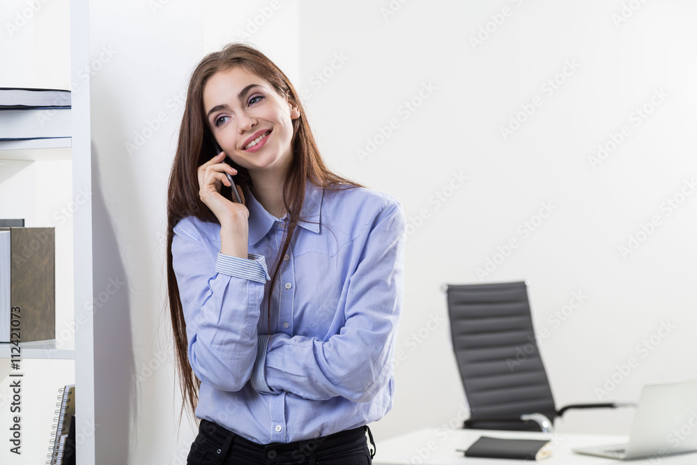 Smiling businesswoman on phone Smiling businesswoman on phone