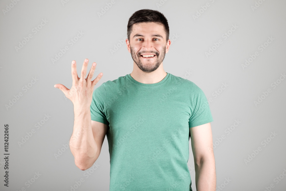 Man showing number by fingers Man showing number by fingers