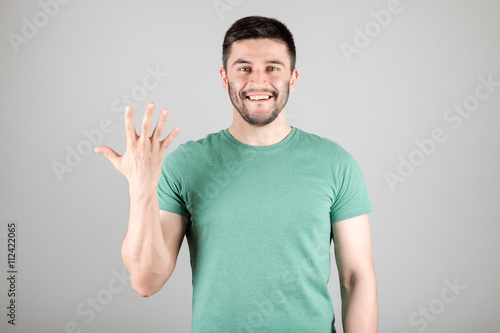 Man showing number by fingers