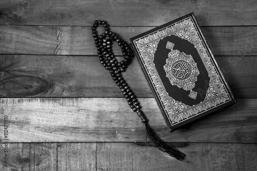 Koran - holy book of Muslims,ฺblack and white  style filtered photo photo