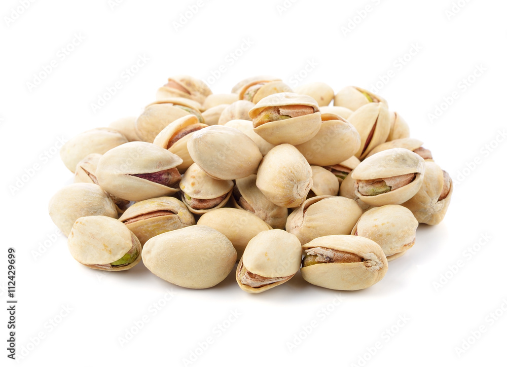 Pistachio nuts isolated on a white background. Pistachio nuts isolated on a white background.