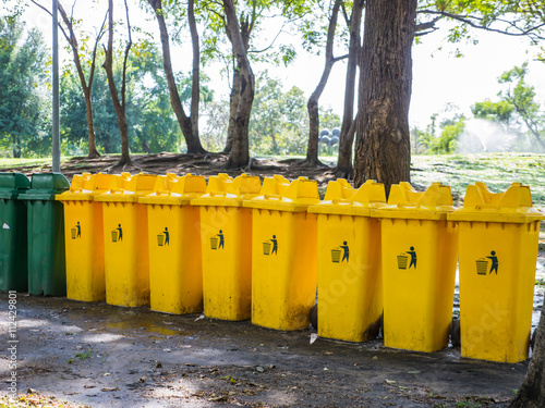 Yellow bins in public park