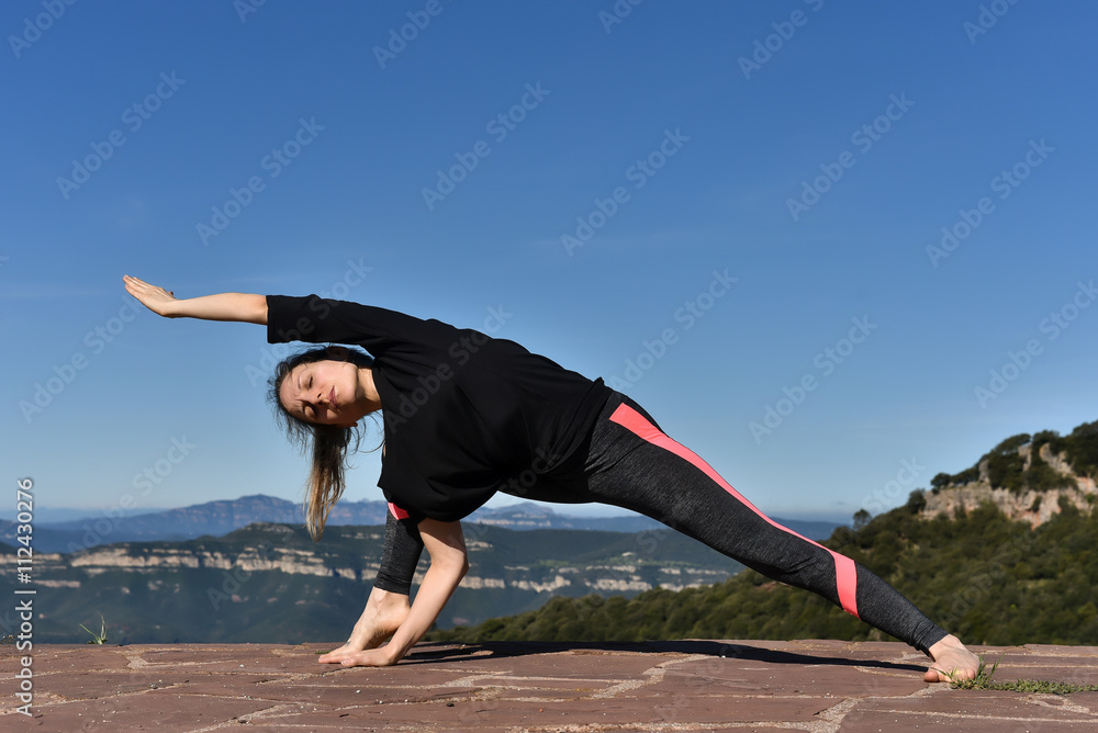Fototapeta premium Woman doing Yoga