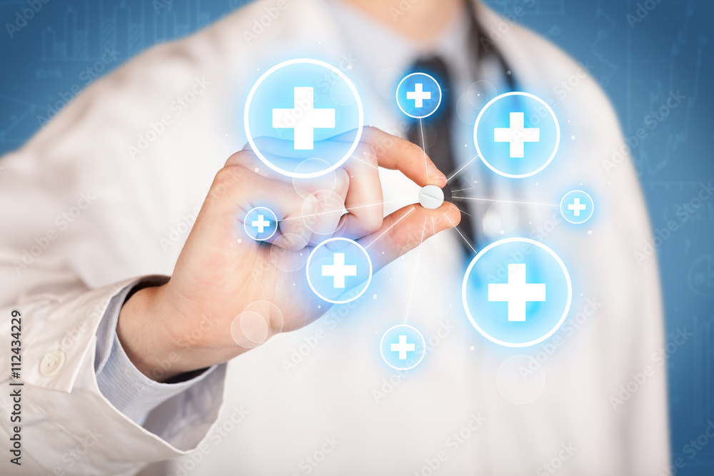 A doctor showing a pill with crosses A doctor showing a pill with crosses