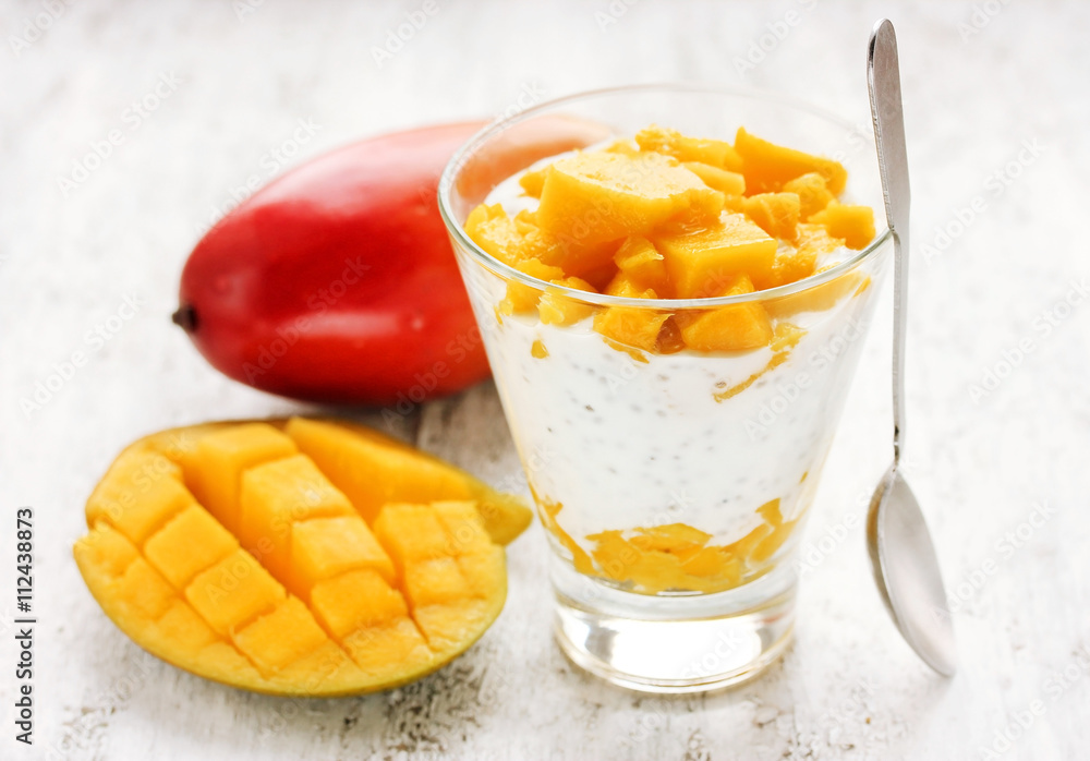 Diet breakfast concept - layered chia seed pudding with mango Diet breakfast concept - layered chia seed pudding with mango