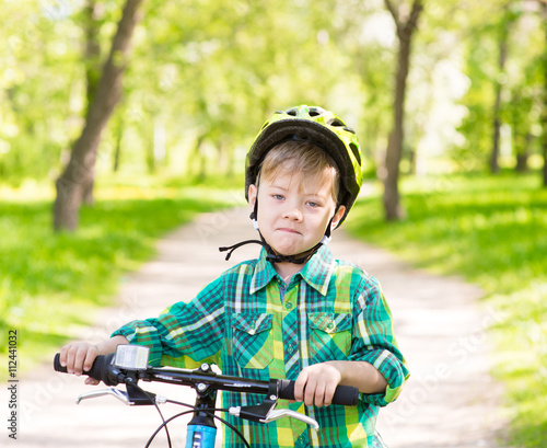 child learns to ride a bike