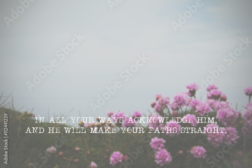 Inspirational verse from the bible on a blurred background photo