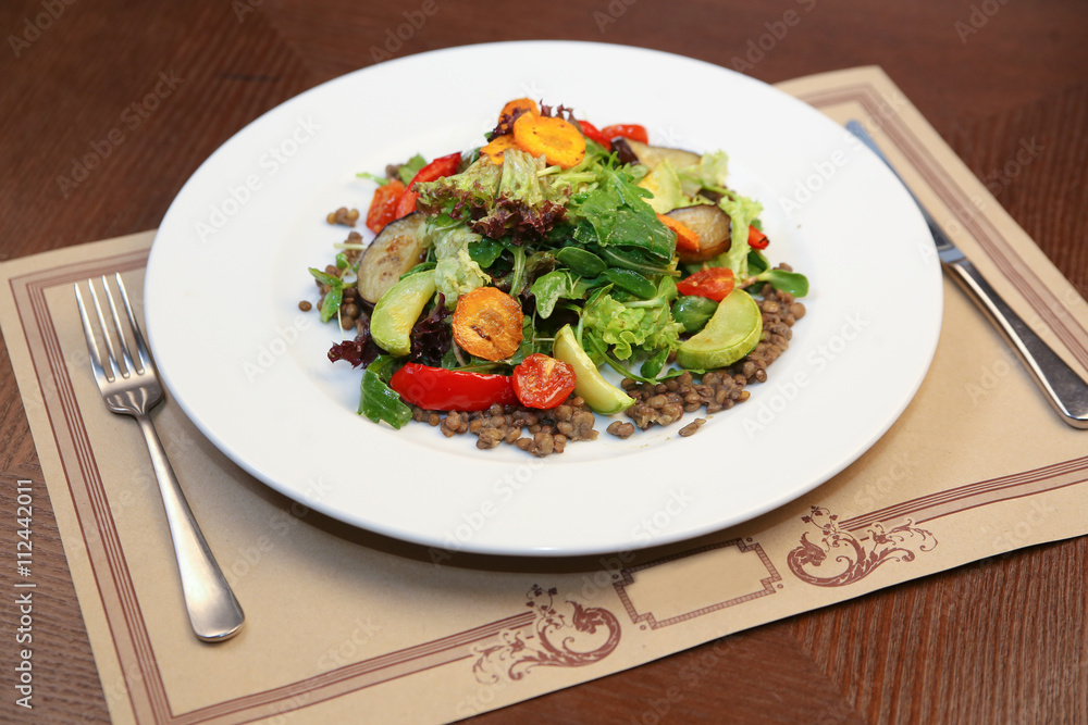 Fresh salad with chicken, tomatoes and mixed greens Fresh salad with chicken, tomatoes and mixed greens
