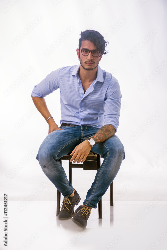 Stylish handsome young man in studio shot Stylish handsome young man in studio shot